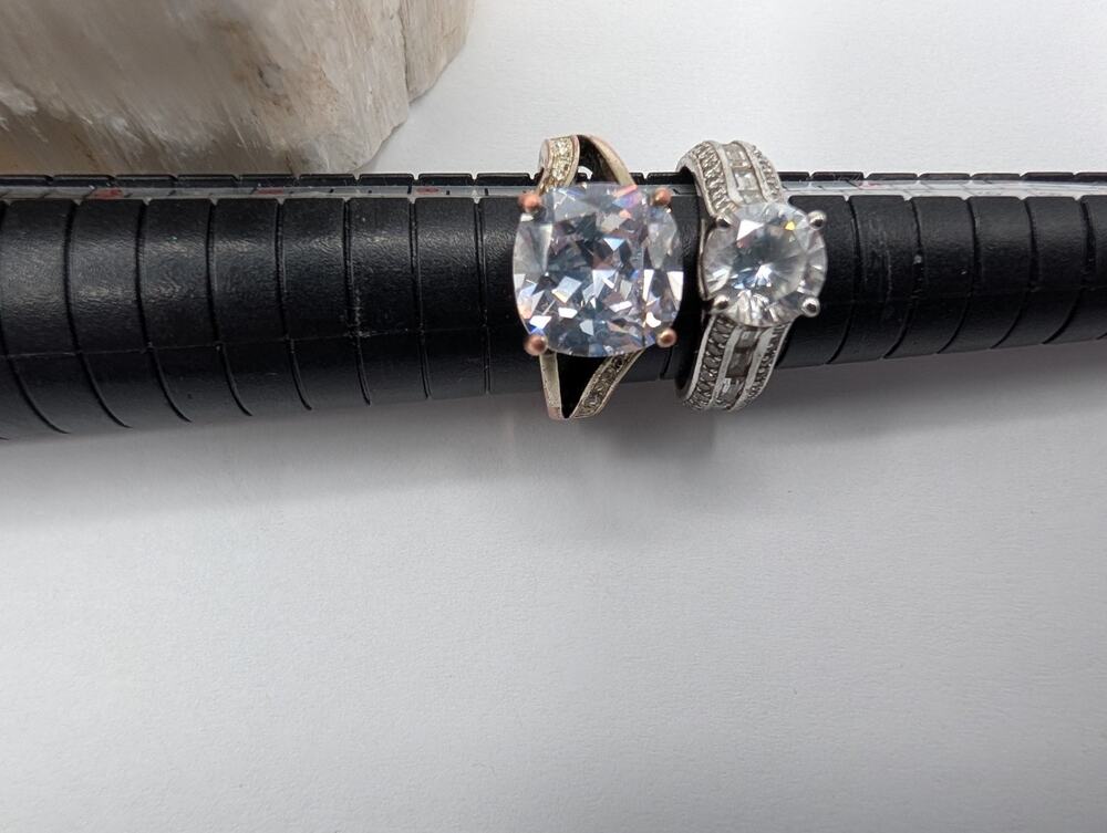 Set of two costume rings large CZs silver tone flaws READ